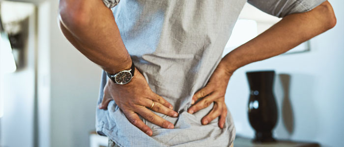 man wiht low back pain